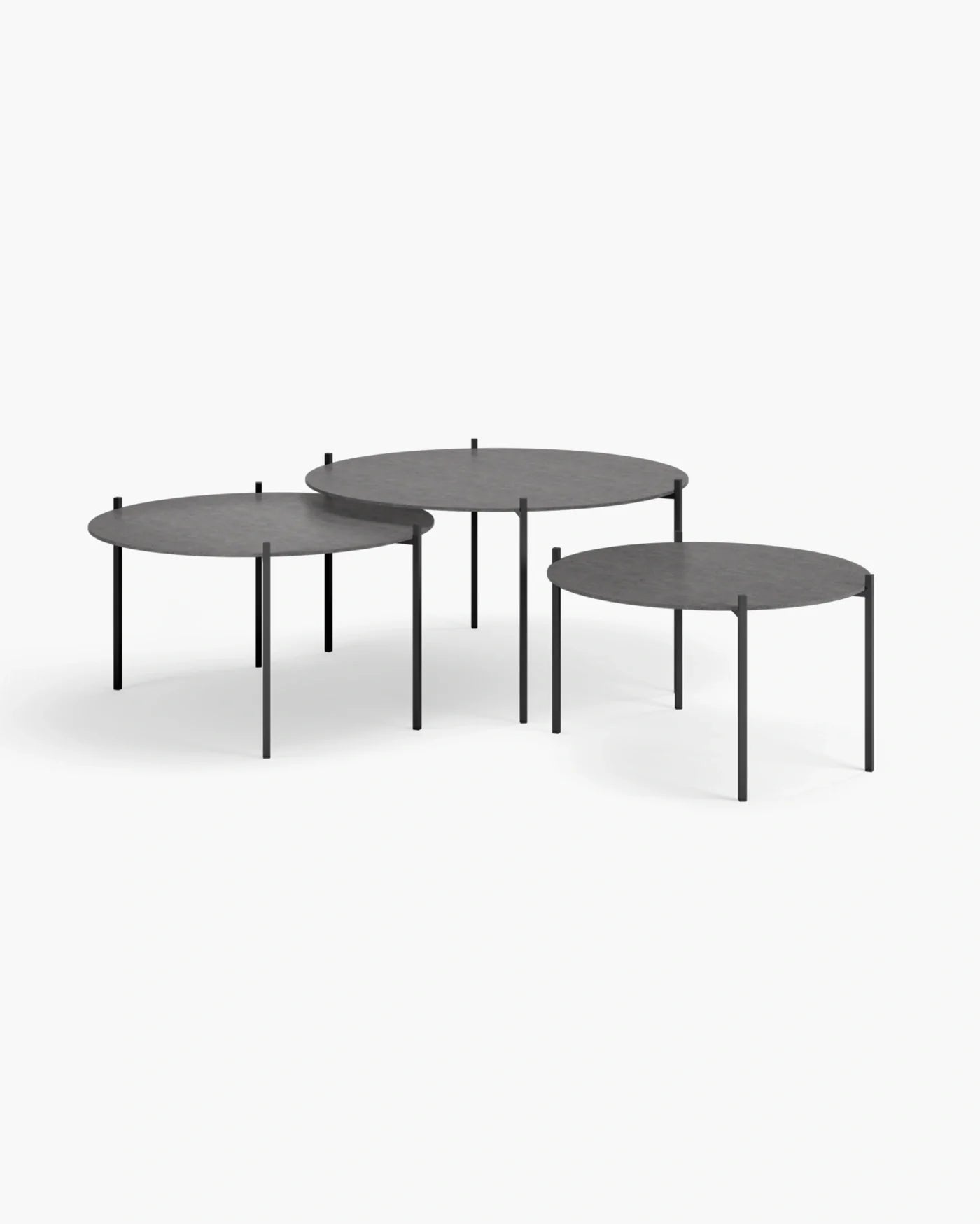 Leo coffee table set in black with Grafite dekton, featuring three sleek round tables with minimalist design.